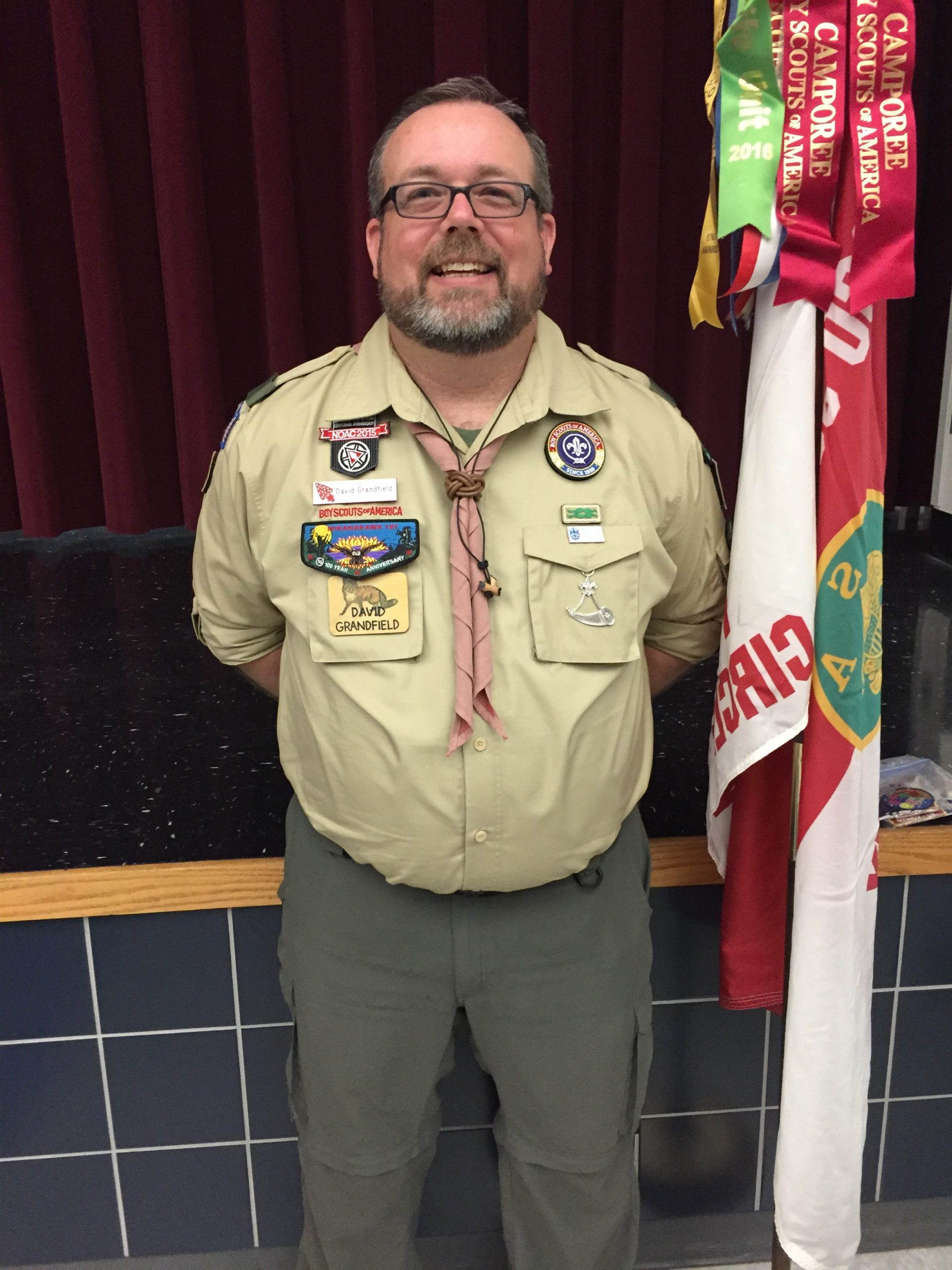 Scoutmaster David Grandfield after being awarded his  Beads, Woggle and Neckerchief