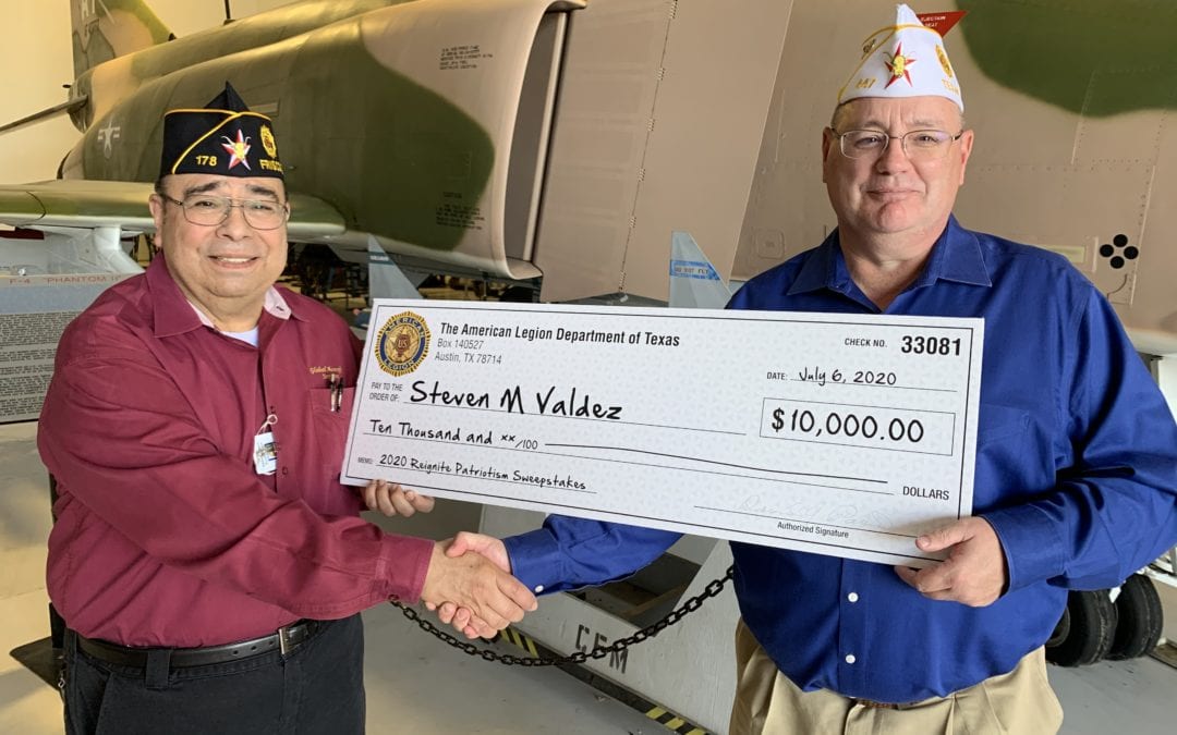 Department of Texas Reignite Patriotism Sweepstakes winner Steven Valdez, Post 178 member, accepting $10,000 check from Bill West, Department of Texas Adjutant