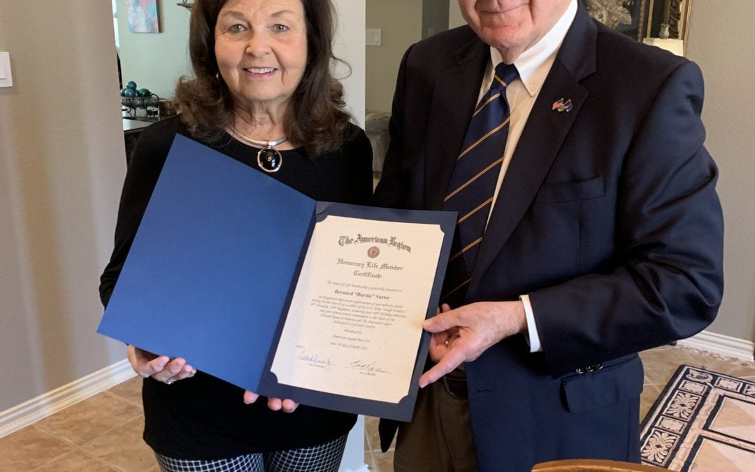 Sandi Richards, daughter of WWII Veteran Burnie Sutter, accepts Honorary Life Member Certificate on her father’s behalf from Fred Rogers, Post 178 Commander