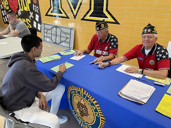 Post 178 Legionnaires Register New Voters at Memorial High School